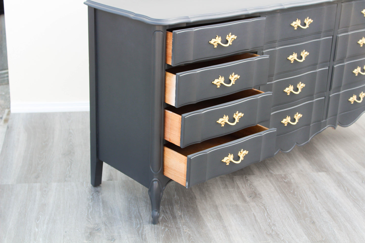 1970's French Provincial Charcoal Black Dresser of Twelve Drawers