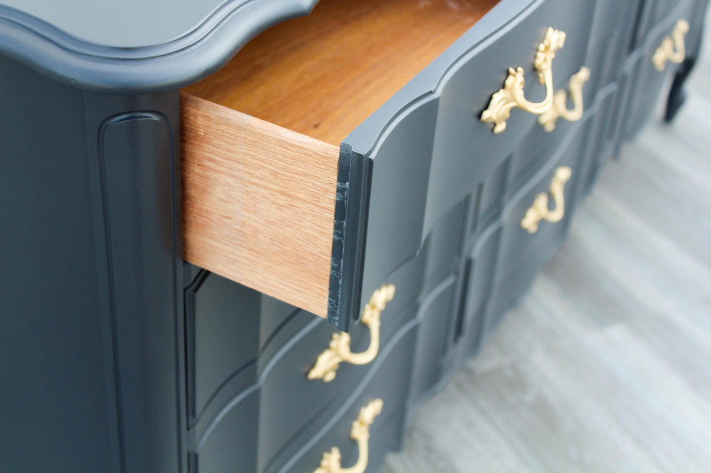 1970's French Provincial Charcoal Black Dresser of Twelve Drawers