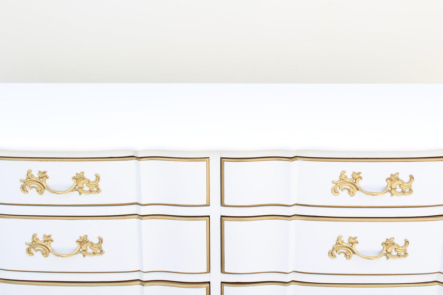 1970's French Provincial White and Gold Dresser of Eight Drawers