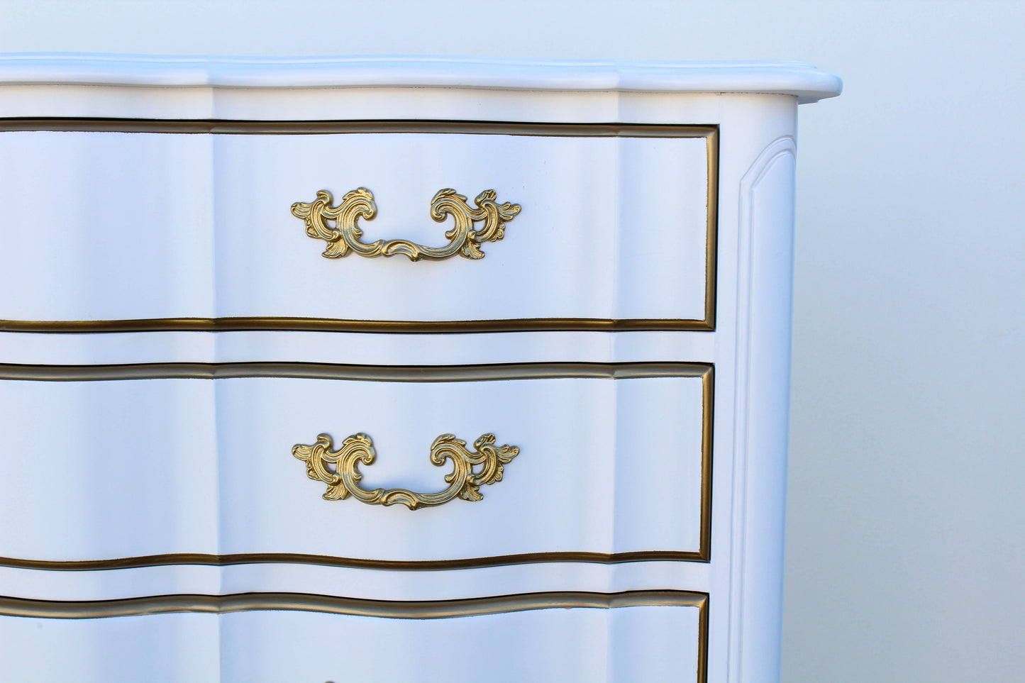 1970's French Provincial White and Gold Highboy of Seven Drawers