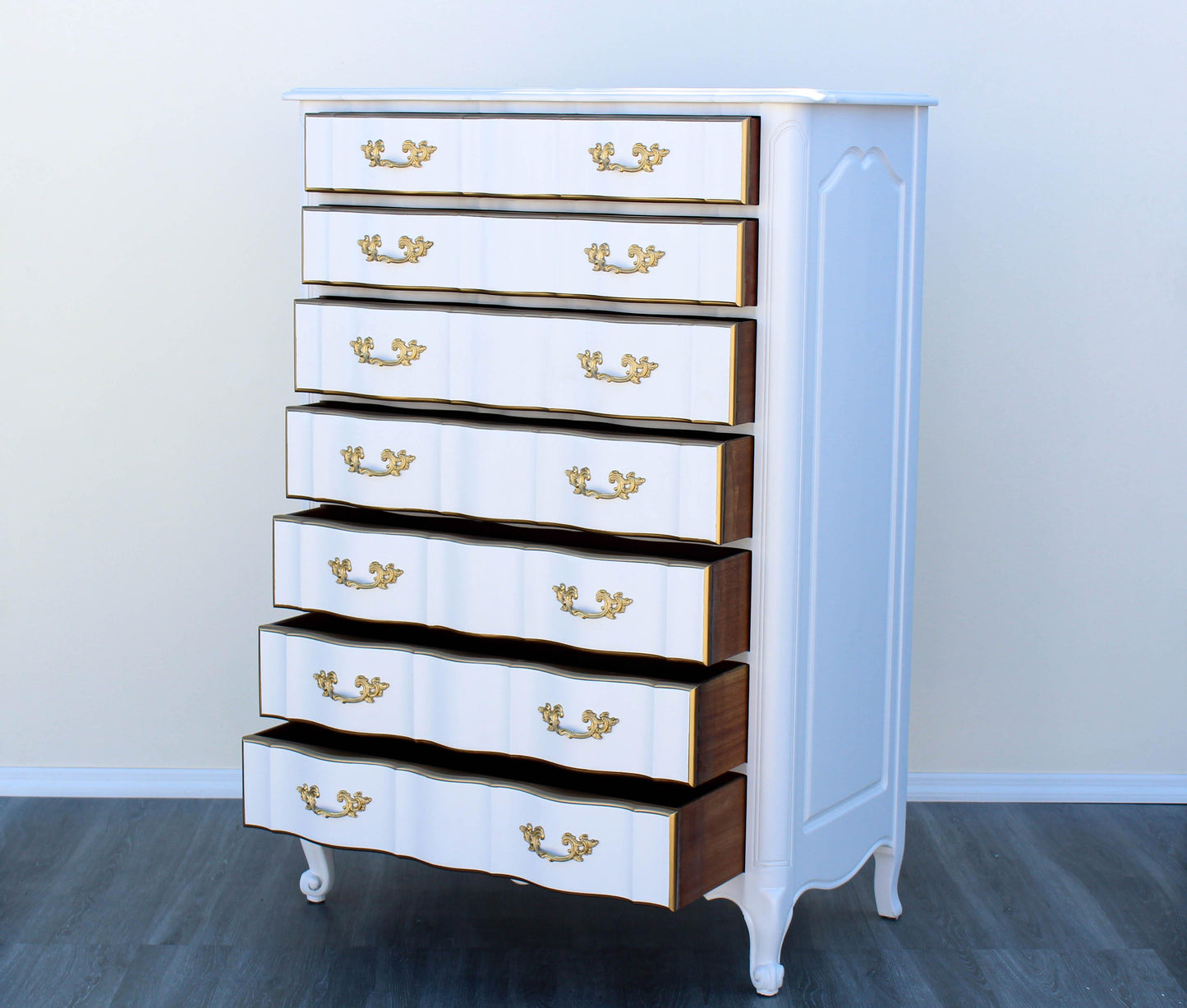 1970's French Provincial White and Gold Highboy of Seven Drawers