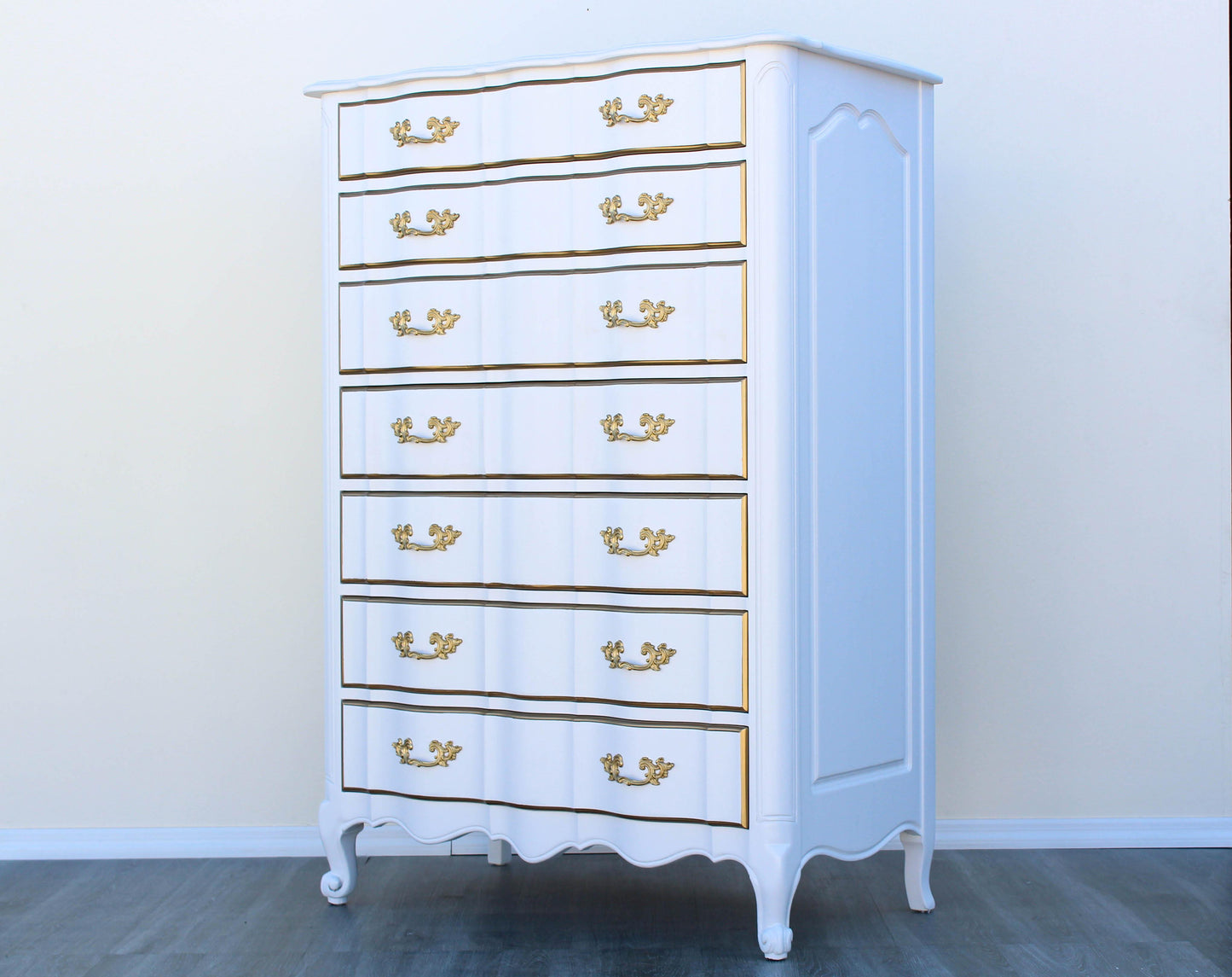 1970's French Provincial White and Gold Highboy of Seven Drawers