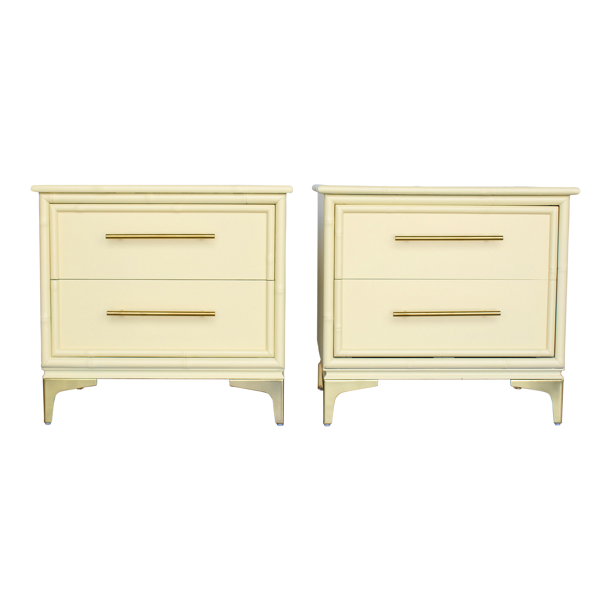 Pair of 1970's Canary Yellow Faux Bamboo nightstands.  These pair of nightstands are professionally refinished in canary yellow with satin top coat and metal feet. Dimensions: 24"Width x 16"Depth x 23.5"Height. 