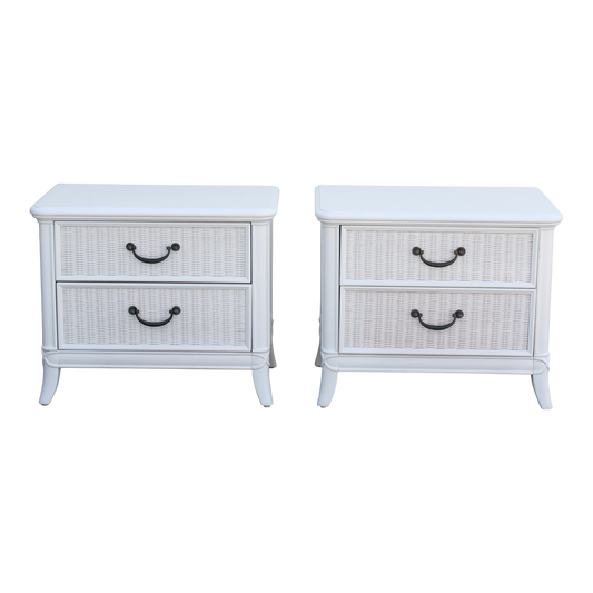 Pair of walnut and wicker nightstands By Martinsville. These nightstands are refinished in white with a satin topcoat. Dimensions: 26"Width x 17"Depth x 24"Height.