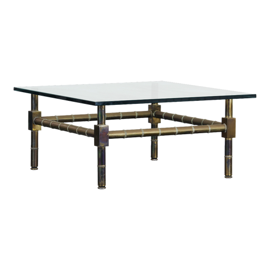 Mid Century Mastercraft brass coffee table with glass top.  This table has a nice vintage patina.  Dimensions: 35"Width x 35" Depth x 16"Height. 