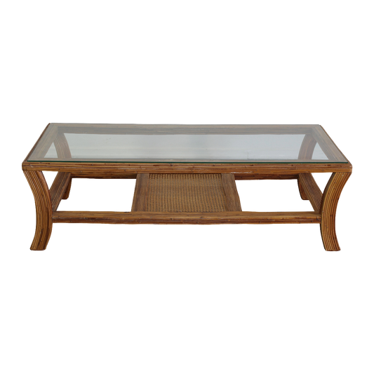 Vintage pencil reed coffee table with glass top.  Dimensions; 52" Width x 22" Depth x 16" Height. 