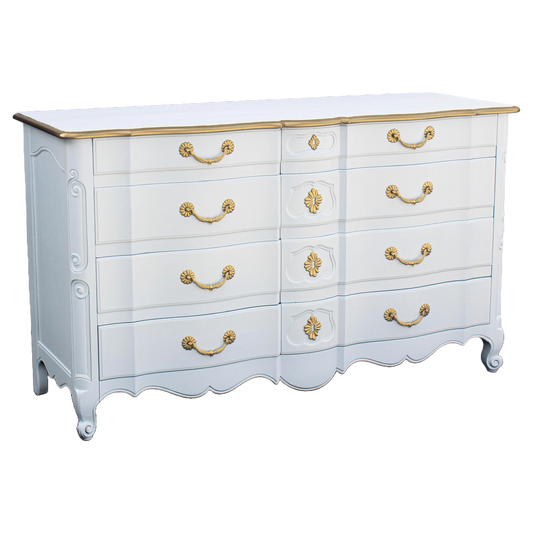 Vintage solid built John Widdicomb dresser of eight drawers.  This is a solid built dresser with dovetail joint, is newly refinished in a white satin topcoat and gold painted accents.  Dimensions: 62"Width x 22"Depth x 36"Height. 