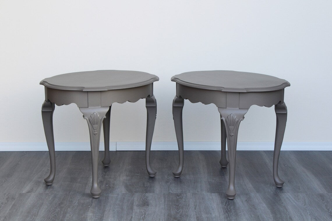 Pair of solid built Georgian style side tables.  These tables are professionally refinished in greige gray with a satin finish.  Dimensions; 28"Width x 22"Depth x 23"Height. 