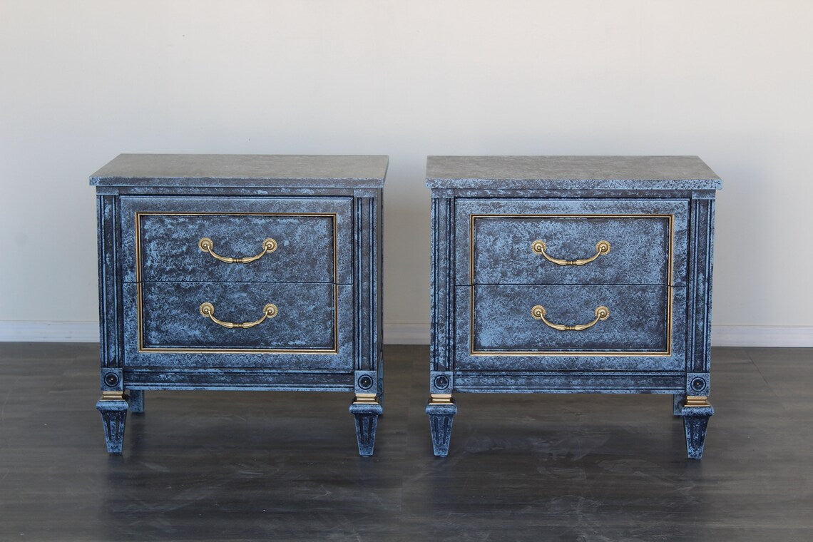 Pair of Mid century solid built walnut nightstands.  The nightstands are professionally refinished with a blue faux finish.  Dimensions: 25"width x 16"Depth x 25"Height. 