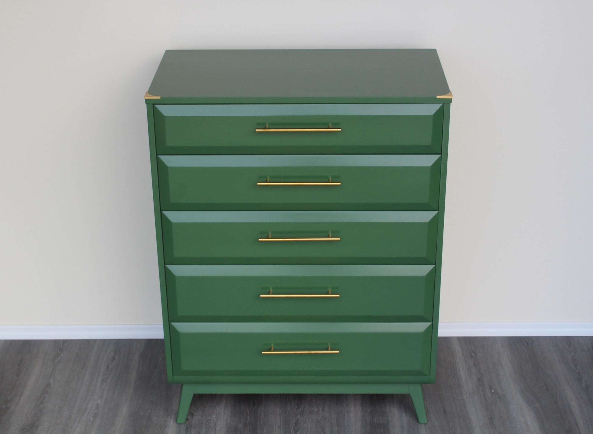 Mid Century walnut highboy of five drawers.  This is a solid built walnut chest with dovetail joint.  This chest is professionally refinished in green with gloss top coat and gold tone hardware.  Dimensions: 36"Width x 19"Depth x 48"Height. 