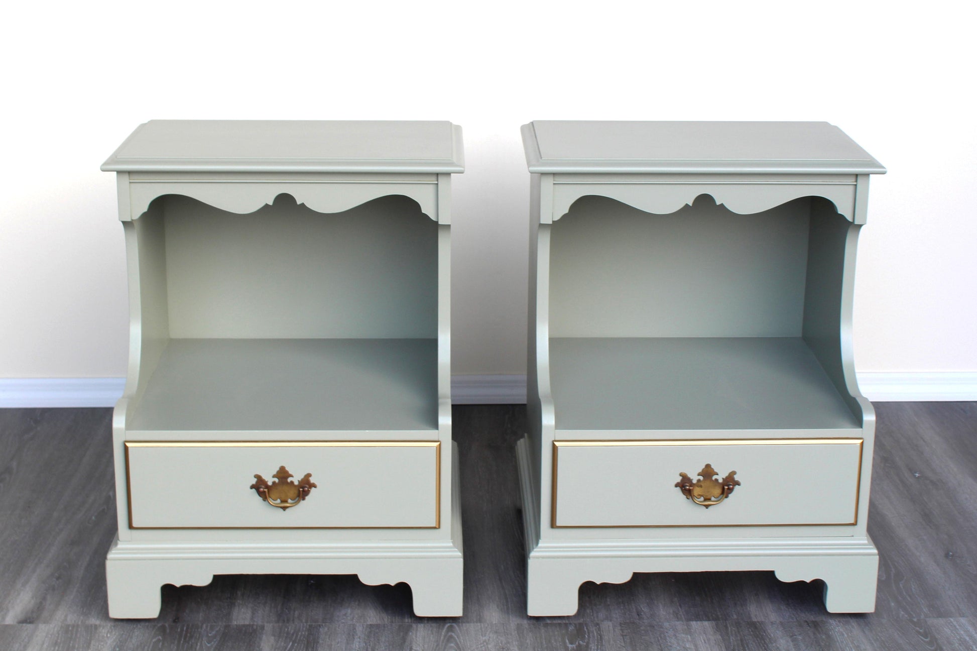 Vintage Georgian style caledon green nightstands.  These nightstands are solid built with dovetail joints and professionally refinished in green with satin top coat.  Dimensions: 21"Width x 17"Depth x 26"Height. 