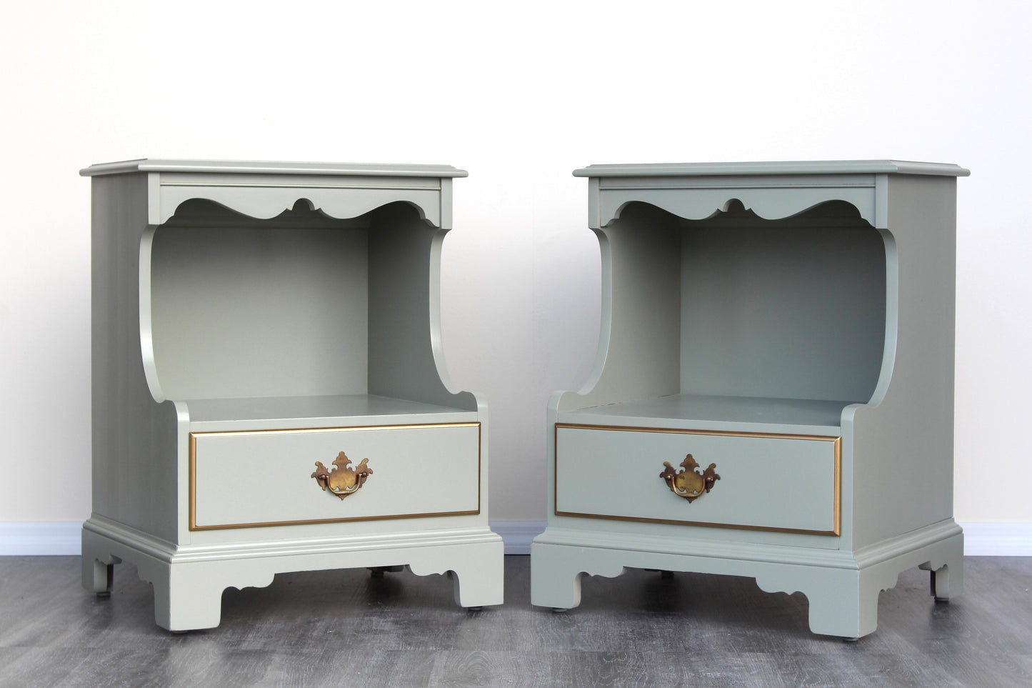 Vintage Georgian style caledon green nightstands.  These nightstands are solid built with dovetail joints and professionally refinished in green with satin top coat.  Dimensions: 21"Width x 17"Depth x 26"Height. 