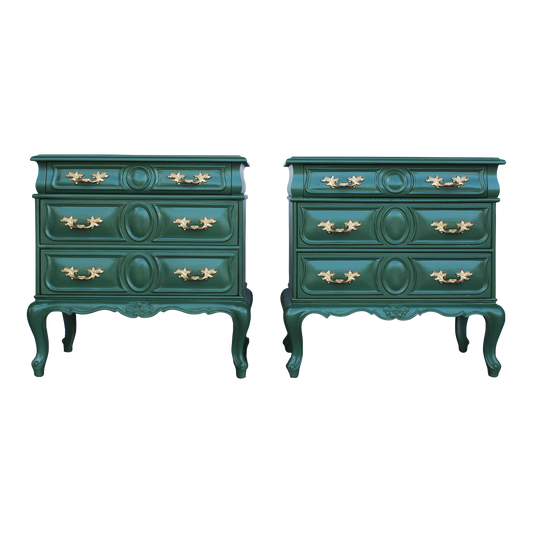 Pair of solid built provincial style nightstands.  The nightstands were professionally painted in green with gloss top coat and gold painted hardware.  Dimensions: 23"Width x 17"Depth x 23.5"Height. 