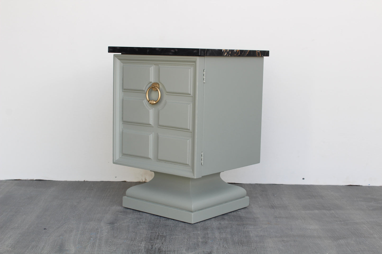 Vintage Art Deco side table with black marble top.  This table was refinished in green with satin top coat.  Dimensions: 15"Width x 15"Depth x 22"Height. 