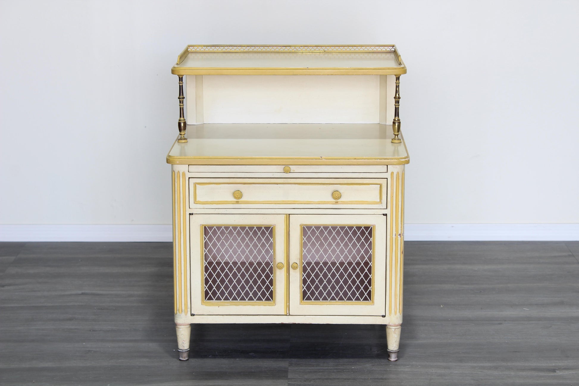 Pair of Late 20th century nightstands.  The nightstands are solid built with dovetail joints and brass accents, and a tray top, a pull out tray and a single drawer with storage space.  Dimensions; 24" Width x 21' Depth x 31" Height x 22" Height to middle top.