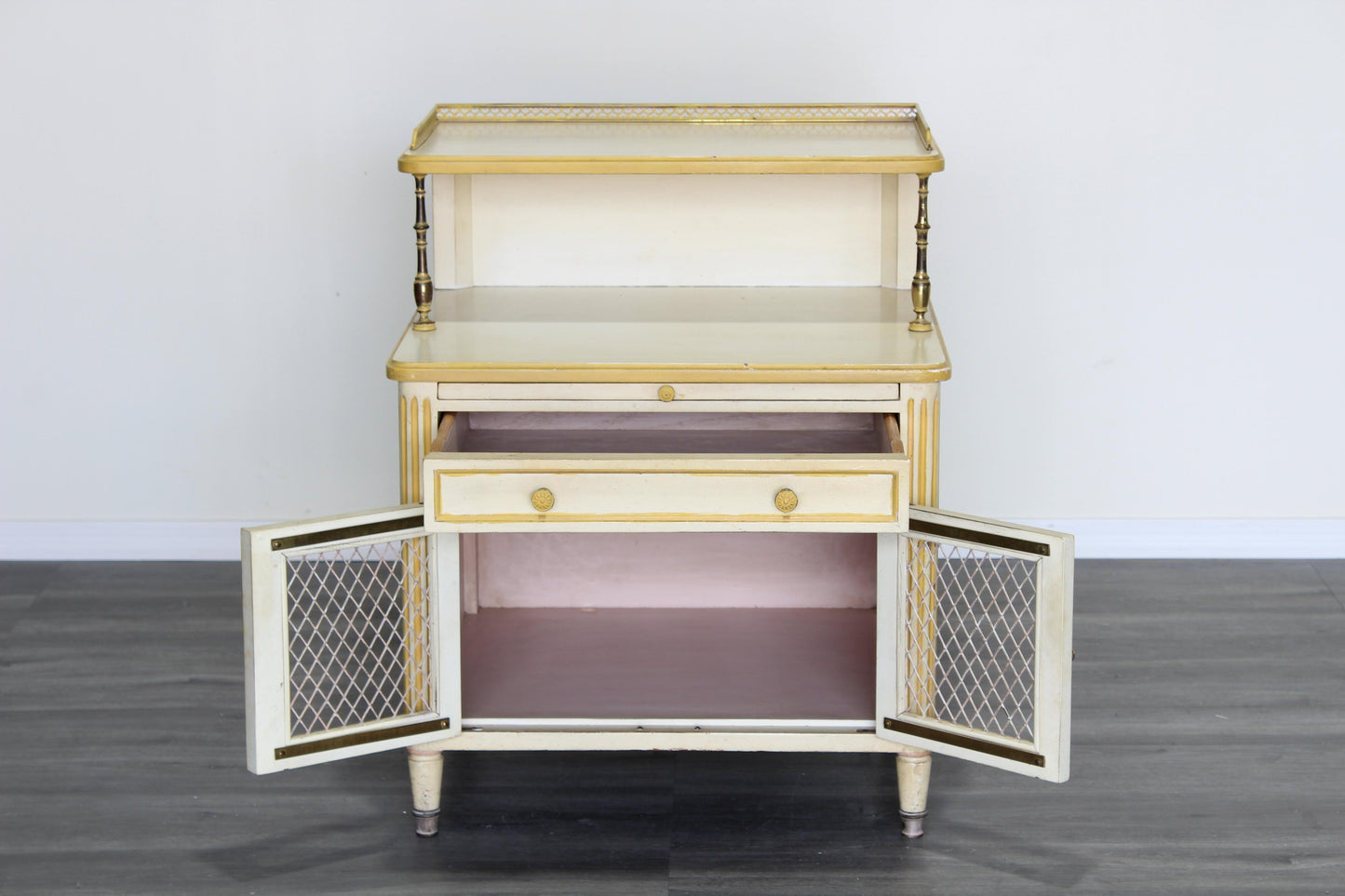 Pair of Late 20th century nightstands.  The nightstands are solid built with dovetail joints and brass accents, and a tray top, a pull out tray and a single drawer with storage space.  Dimensions; 24" Width x 21' Depth x 31" Height x 22" Height to middle top.