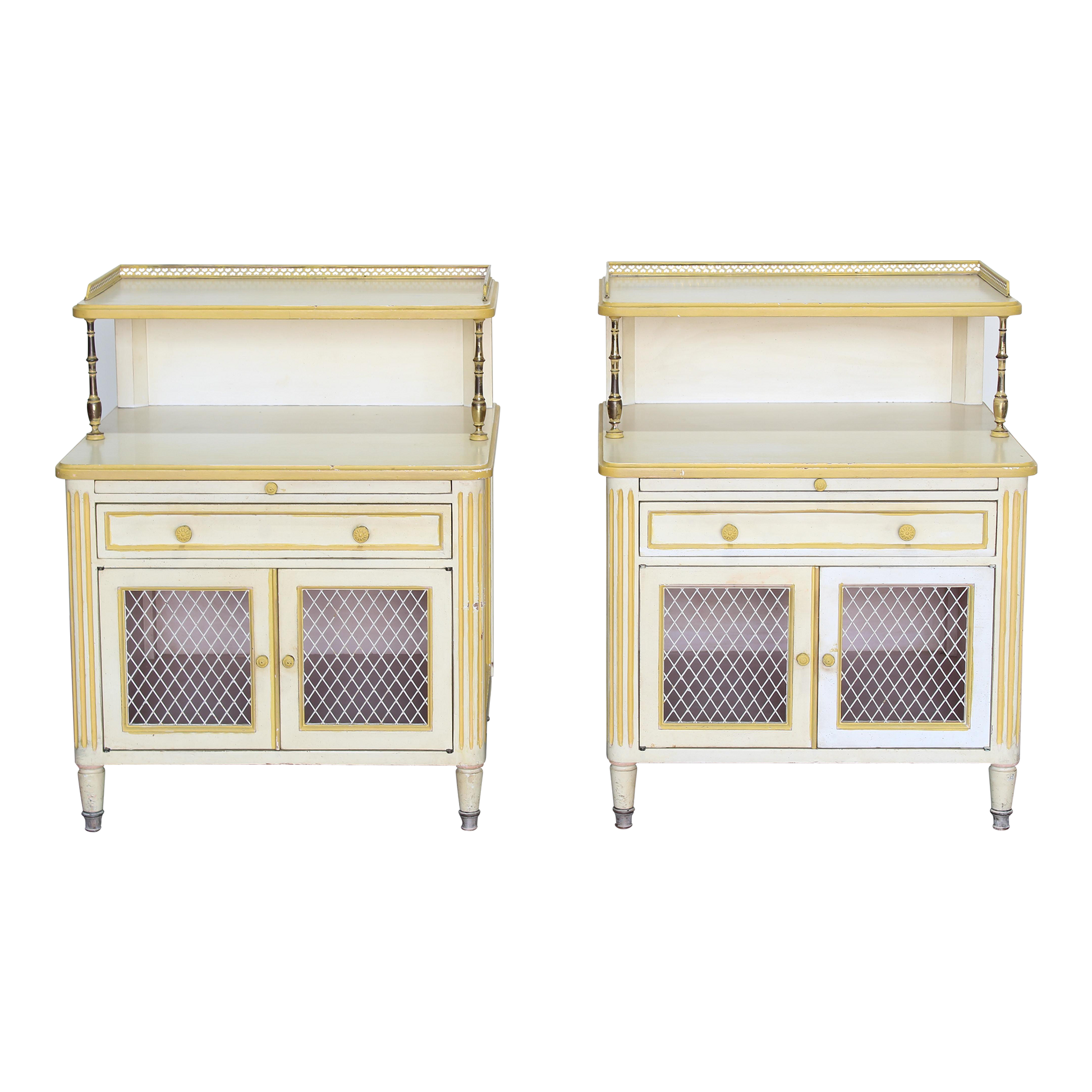 Pair of Late 20th century nightstands.  The nightstands are solid built with dovetail joints and brass accents, and a tray top, a pull out tray and a single drawer with storage space.  Dimensions; 24" Width x 21' Depth x 31" Height x 22" Height to middle top.