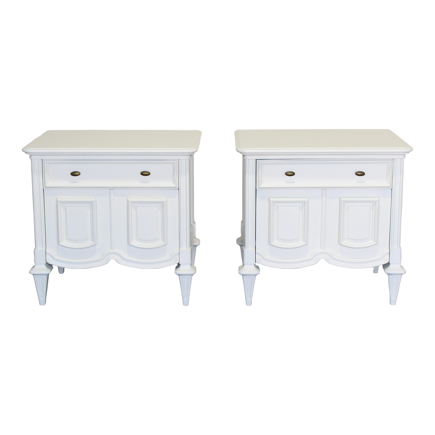 Pair of Mid century modern cream nightstands.  The nightstands are solid built with dovetail joints, are professionally refinished in a white cream color with a satin finish.  Dimensions; 27" Width x 19" Depth x 26" Height.