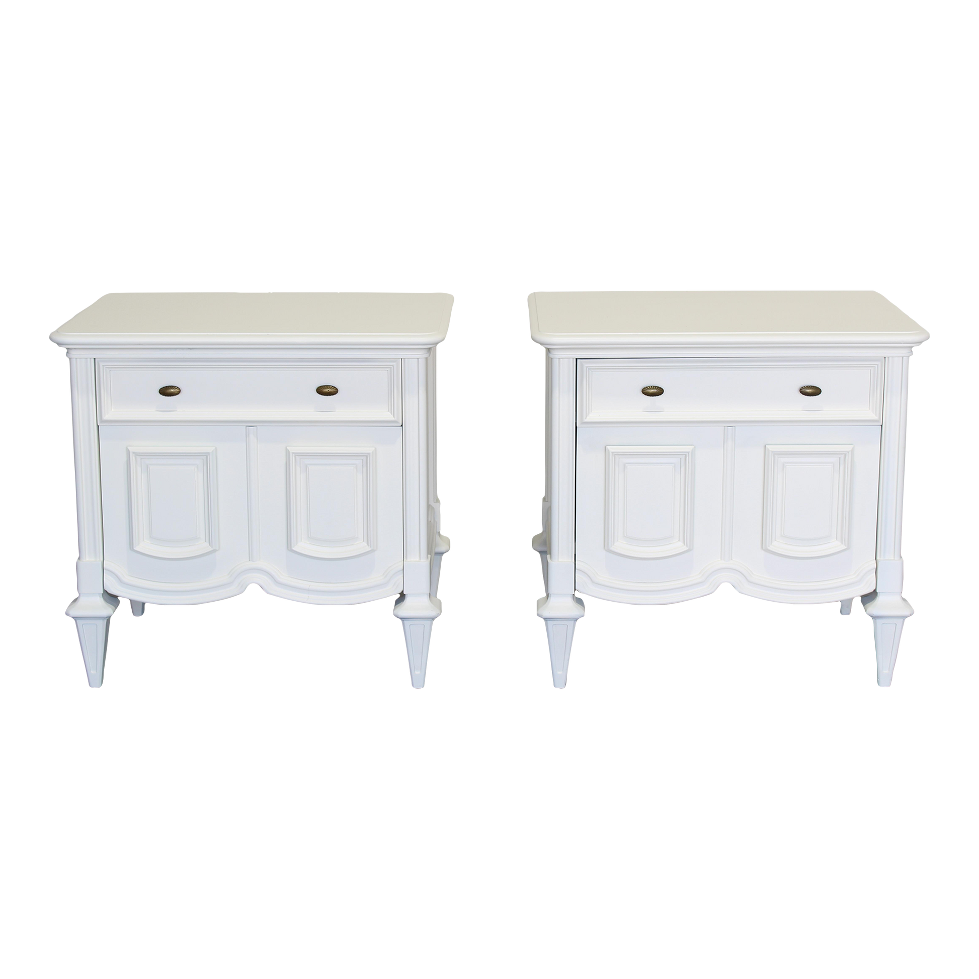 Pair of Mid century modern cream nightstands.  The nightstands are solid built with dovetail joints, are professionally refinished in a white cream color with a satin finish.  Dimensions; 27" Width x 19" Depth x 26" Height.