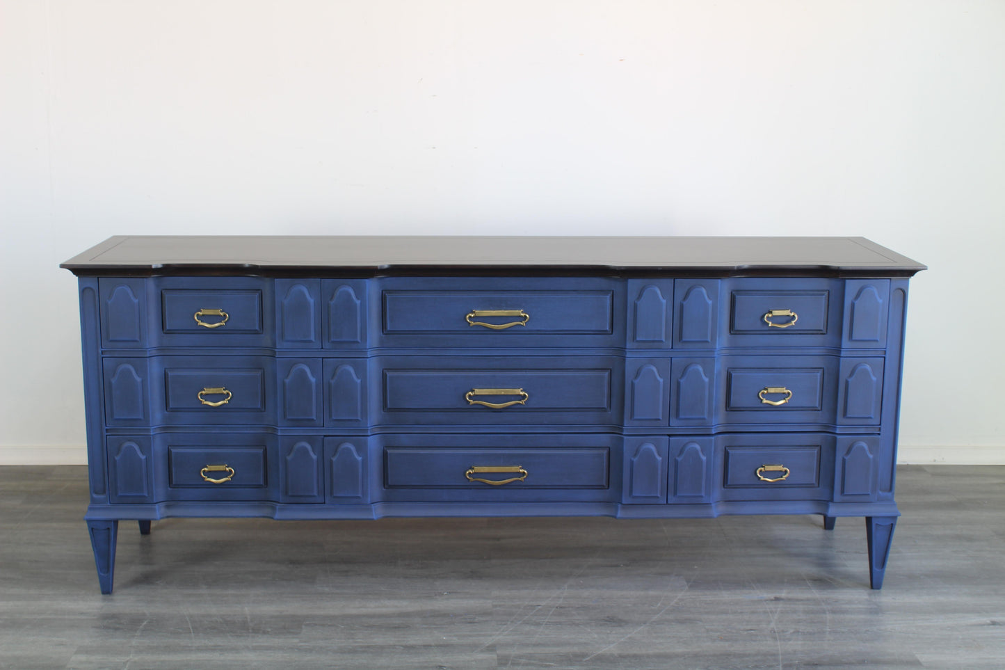 Mid Century Modern nine drawers blue dresser.  This is solid built walnut dresser with dovetail joints.  This dresser is nicely painted in blue with dark walnut stain walnut tops.   Dimensions; 78" Width x 20" Depth x 32" Height. 