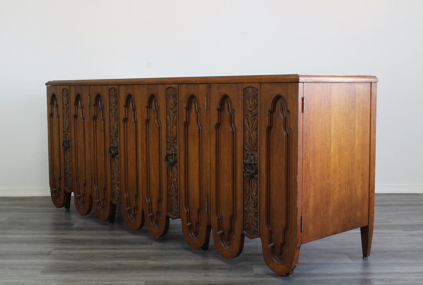 Mid Century Walnut Dresser of Nine Drawers