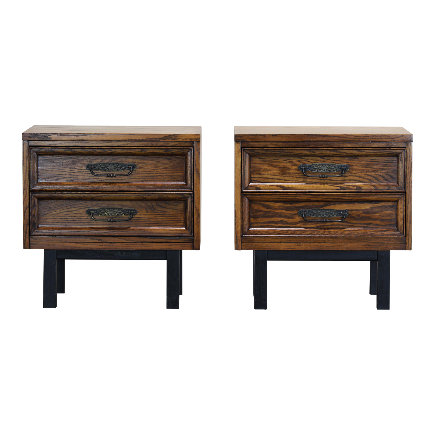 Pair of Mid century walnut nightstands.  The nightstands are solid built with dovetail joints and metal hardware.  Dimensions: 24"Width x 16"Depth x 24"Height. 