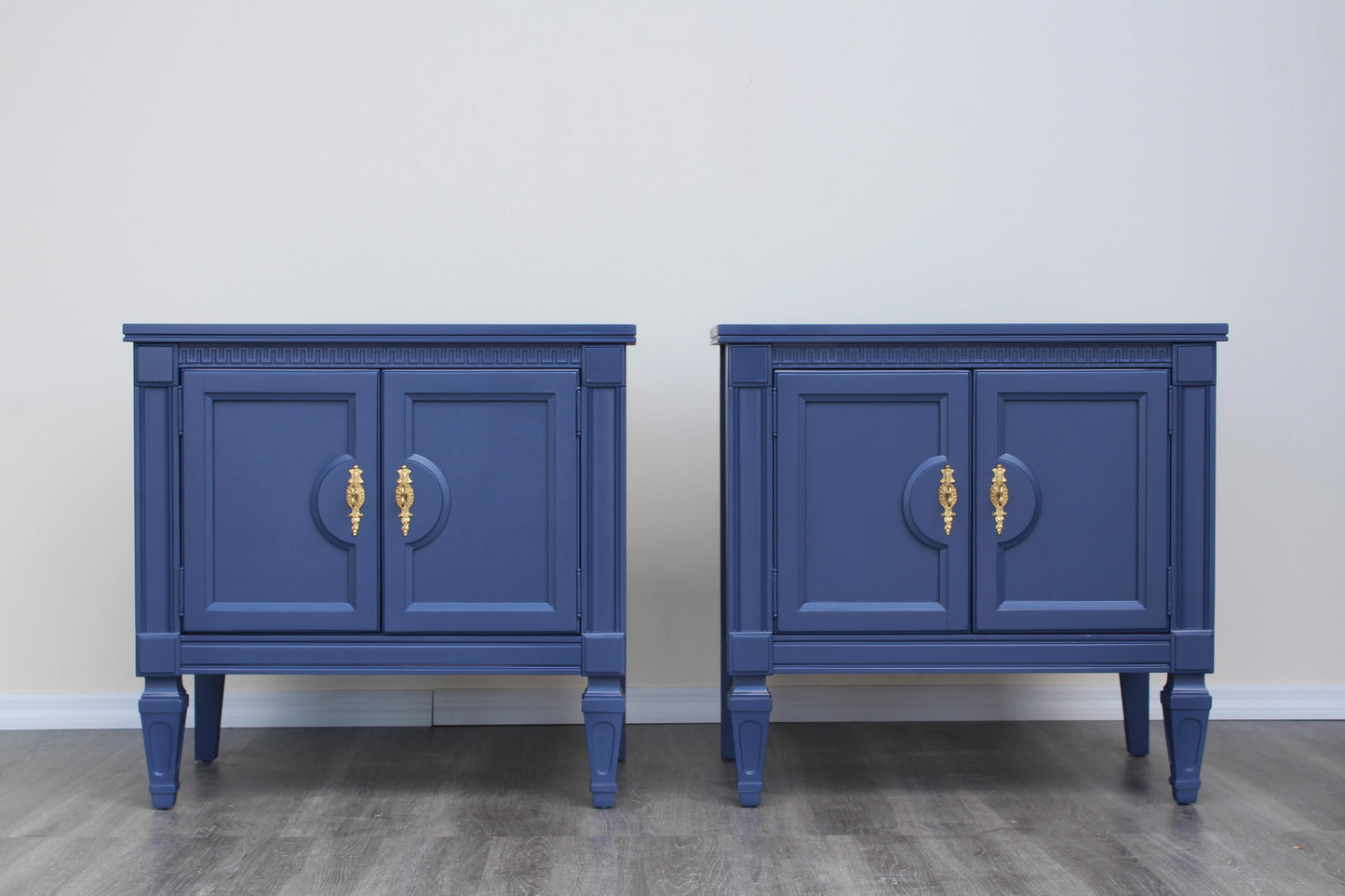 Pair of Late 20th century solid built double doors nightstands.  The nightstands are professionally painted in blue with a satin finish.  Dimensions: 27"Width x 17"Depth x 25"Height. 