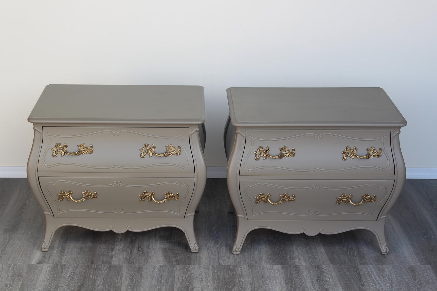 Pair of Mid Century Henredon Nightstands.  These nightstands are solid built with with dovetail joints.  These nightstands are professionally refinished in greige gray with satin finish.  Dimensions; 28"Width x 18"Depth x 24.5"Height. 