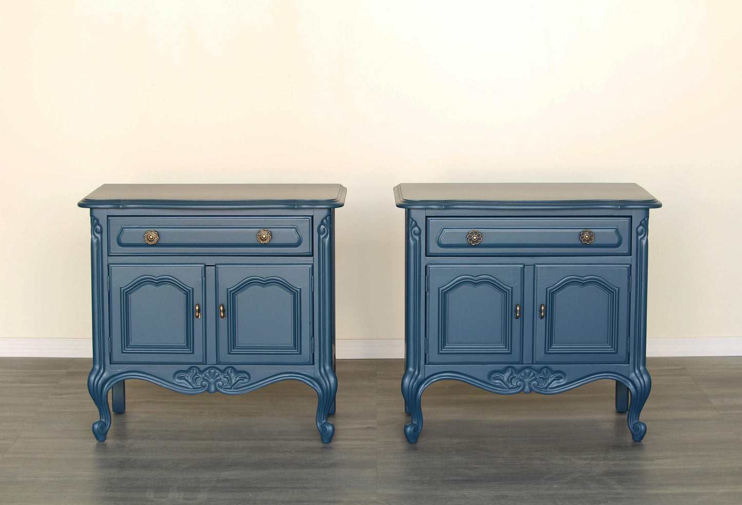 Vintage pair of double door French style nightstands with single drawer.  The nightstands are professionally refinished in blue with satin finish top coat.  Dimensions; 26" Width x 16"Depth x 24" Height. 