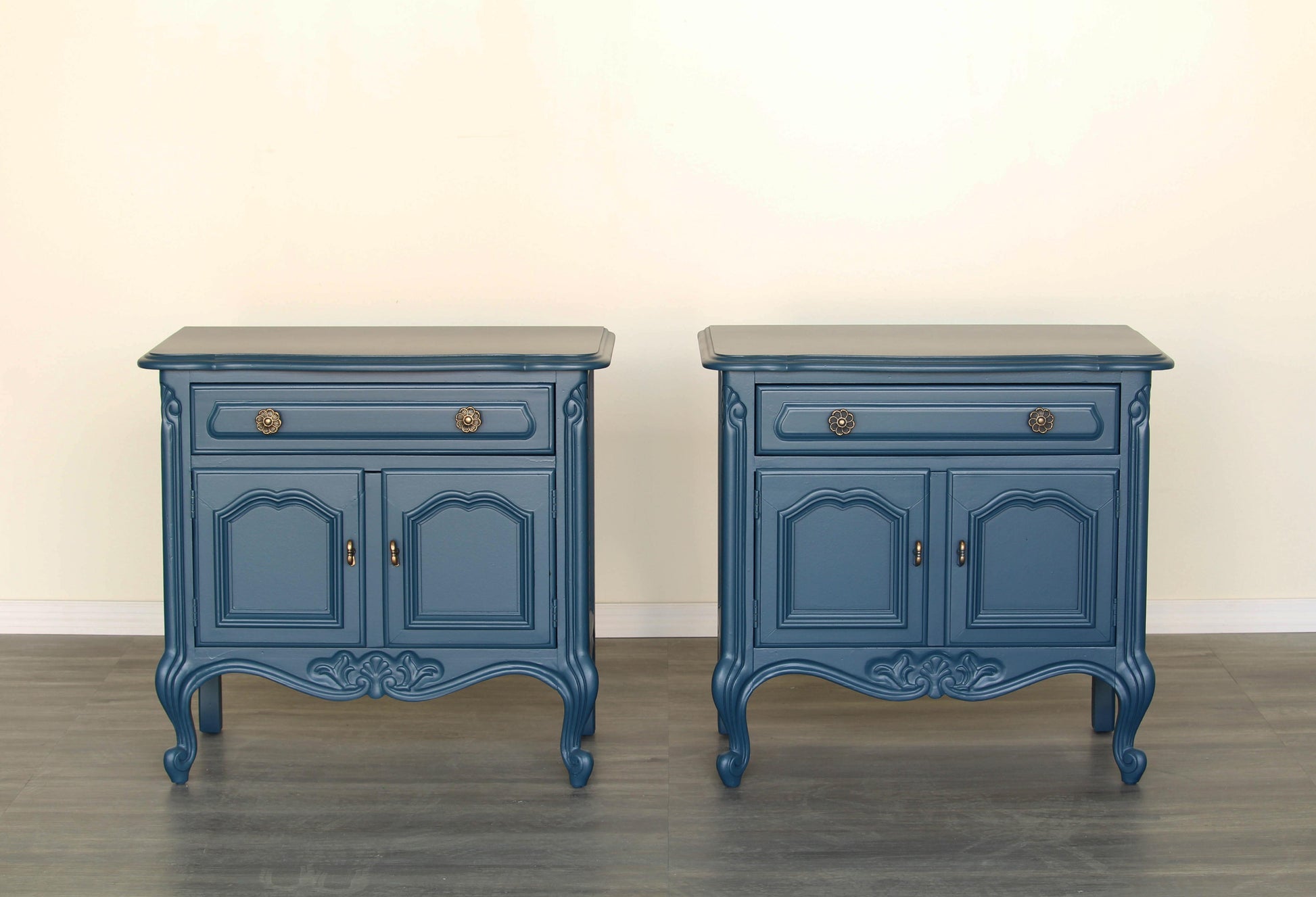 Vintage pair of double door French style nightstands with single drawer.  The nightstands are professionally refinished in blue with satin finish top coat.  Dimensions; 26" Width x 16"Depth x 24" Height. 