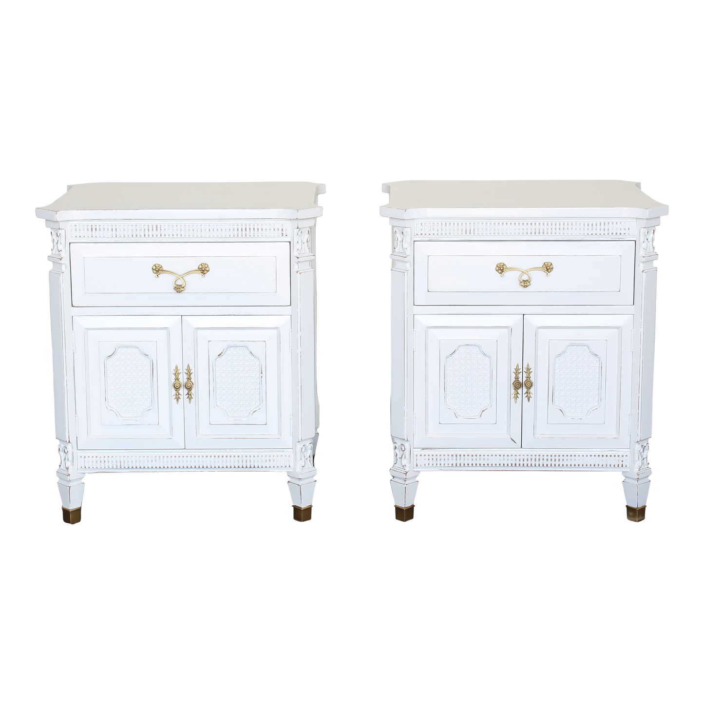 Pair of white neoclassical style nightstands.  The nightstand are solid built with dovetail joints, are professionally refinished in white with a distressed finish.  Dimensions: 25"Width x 20"Depth x 28"Height. 