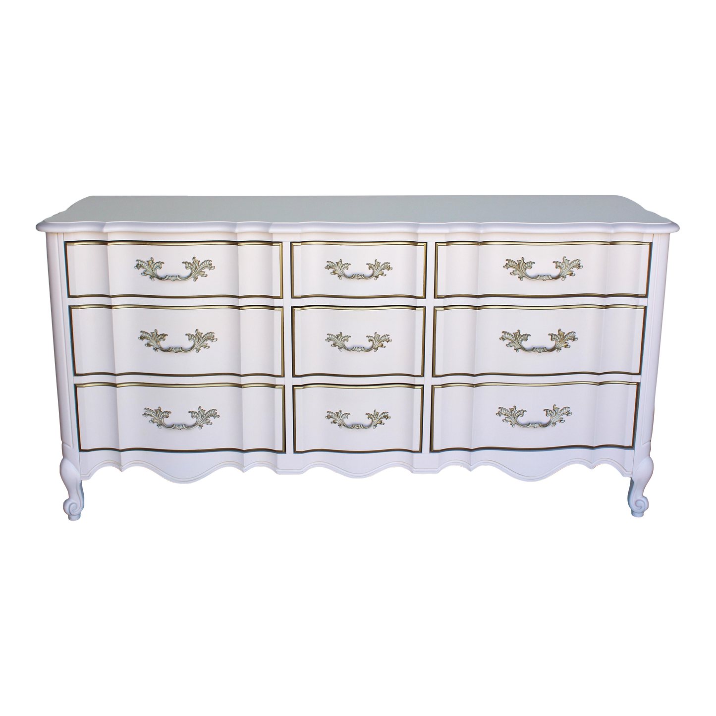 Vintage French provincial solid built dresser of nine drawers.  This dresser was professionally refinished in a Champagne pink and gold with satin top coat.  Dimensions: 64"Width x 20"Depth x 32"Height. 