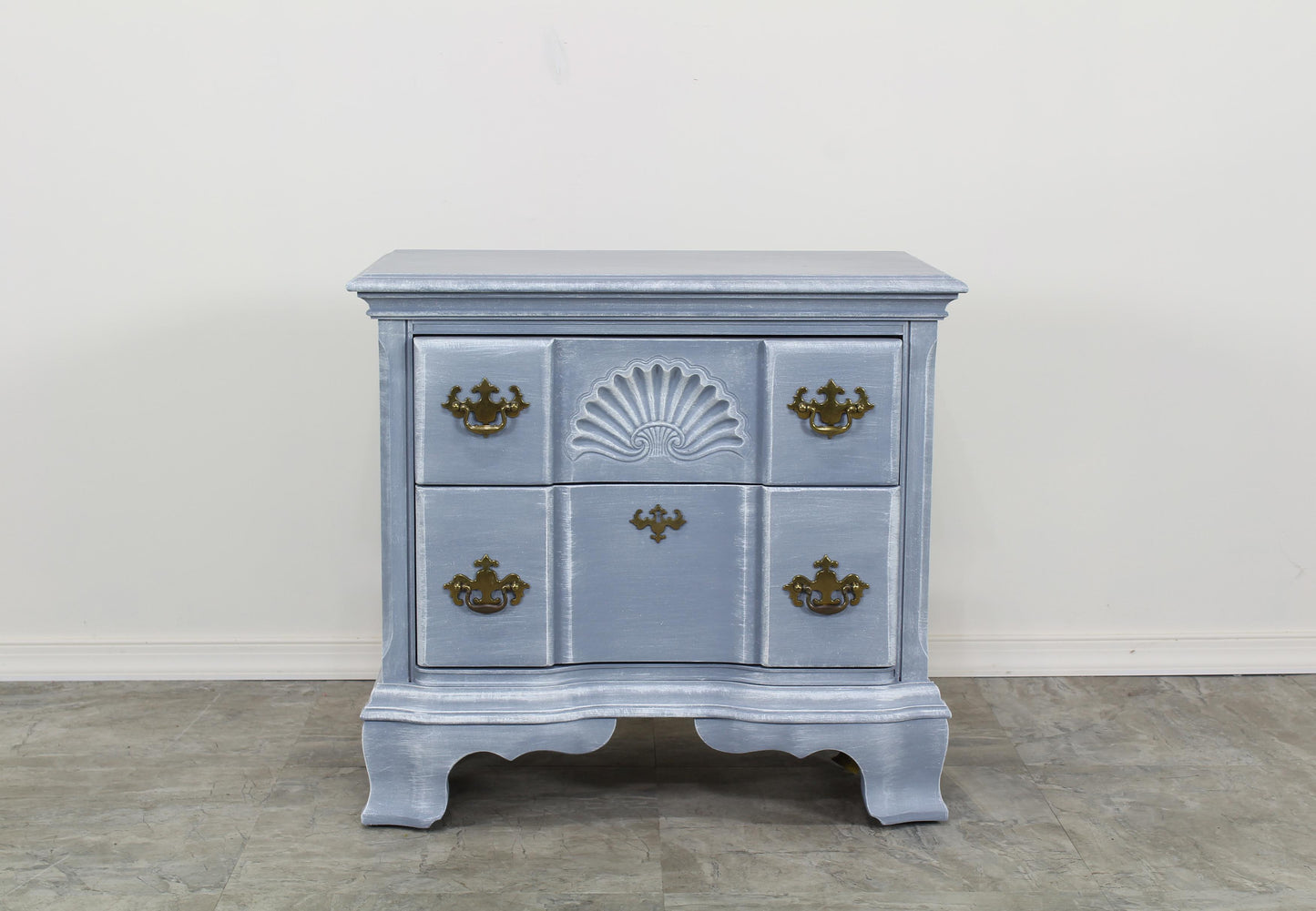 Vintage Chippendale Nightstand.  This is a solid built hand painted nightstand of two drawers with original brass hardware.  Dimensions; 26" Width x 16" Depth x 24.5" Height. 