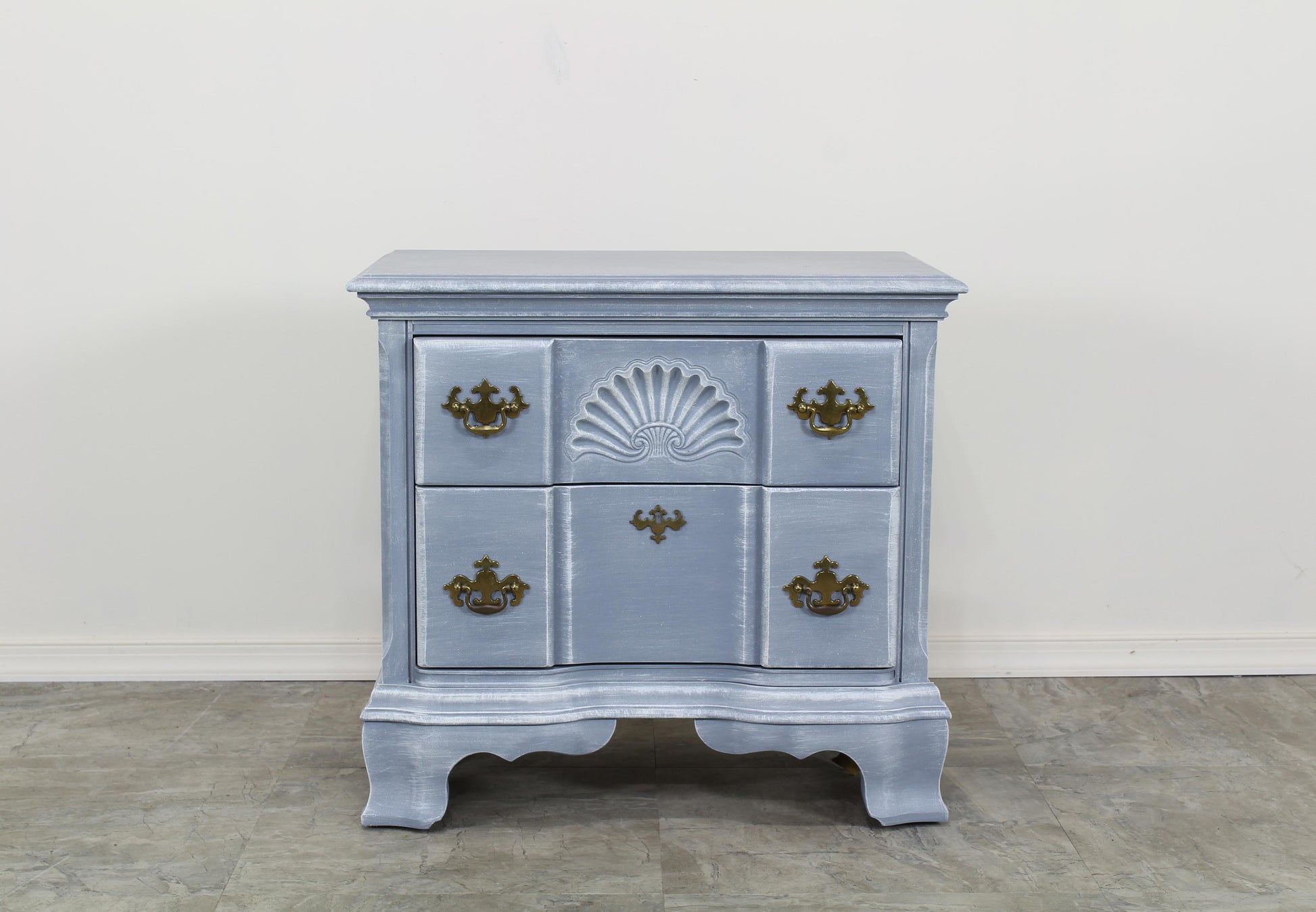 Vintage Chippendale Nightstand.  This is a solid built hand painted nightstand of two drawers with original brass hardware.  Dimensions; 26" Width x 16" Depth x 24.5" Height. 