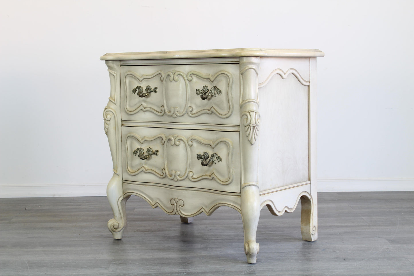 Vintage French Provincial Nightstand of two drawers.  Dimensions; 27" Width x 17" Depth x 26" Height. 