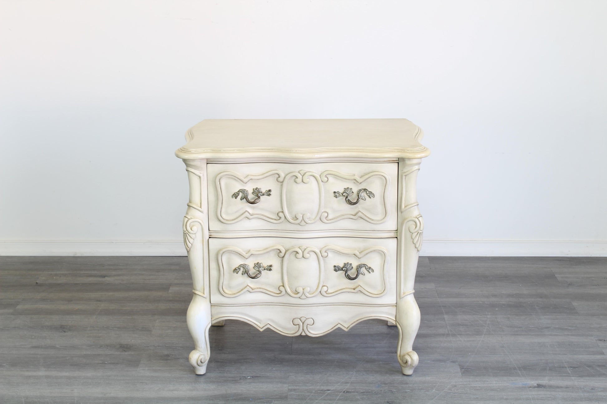 Vintage French Provincial Nightstand of two drawers.  Dimensions; 27" Width x 17" Depth x 26" Height. 