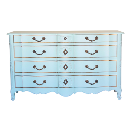 Vintage French provincial dresser of six drawers.  This is a solid built dresser with dovetail joints, professionally finished in mint green with gold painted accents and a distress finish.  Dimensions: 62"Width x 22"Depth x 36"Height. 