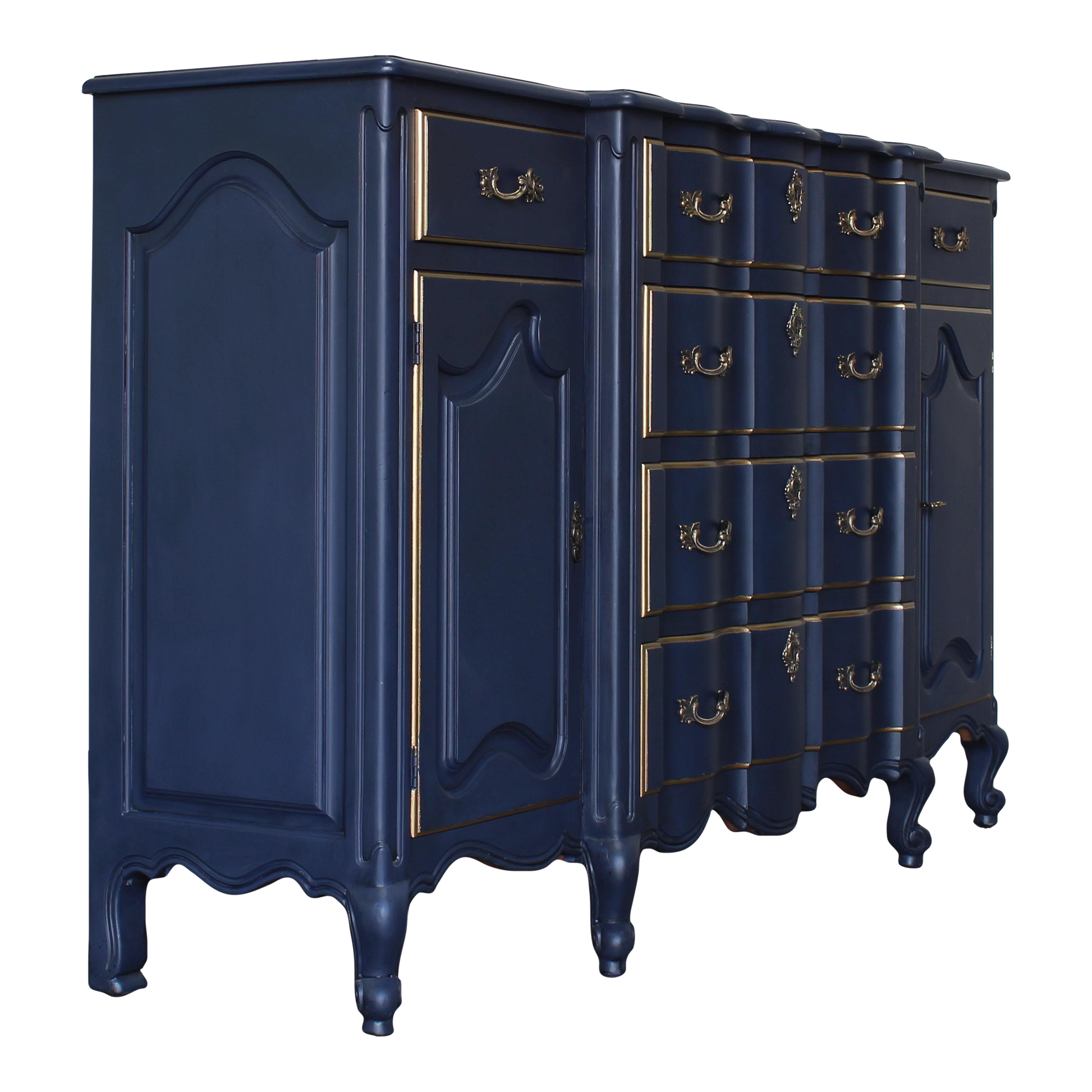 Vintage French style cabinet.  This cabinet is solid built with six drawers and side shelves.  This cabinet is professionally refinished in blue with an antique glaze and gold painted accents. The side doors have a key, door and drawers work well.  Dimensions; 60 Width x 18" Depth x 37" Height. 