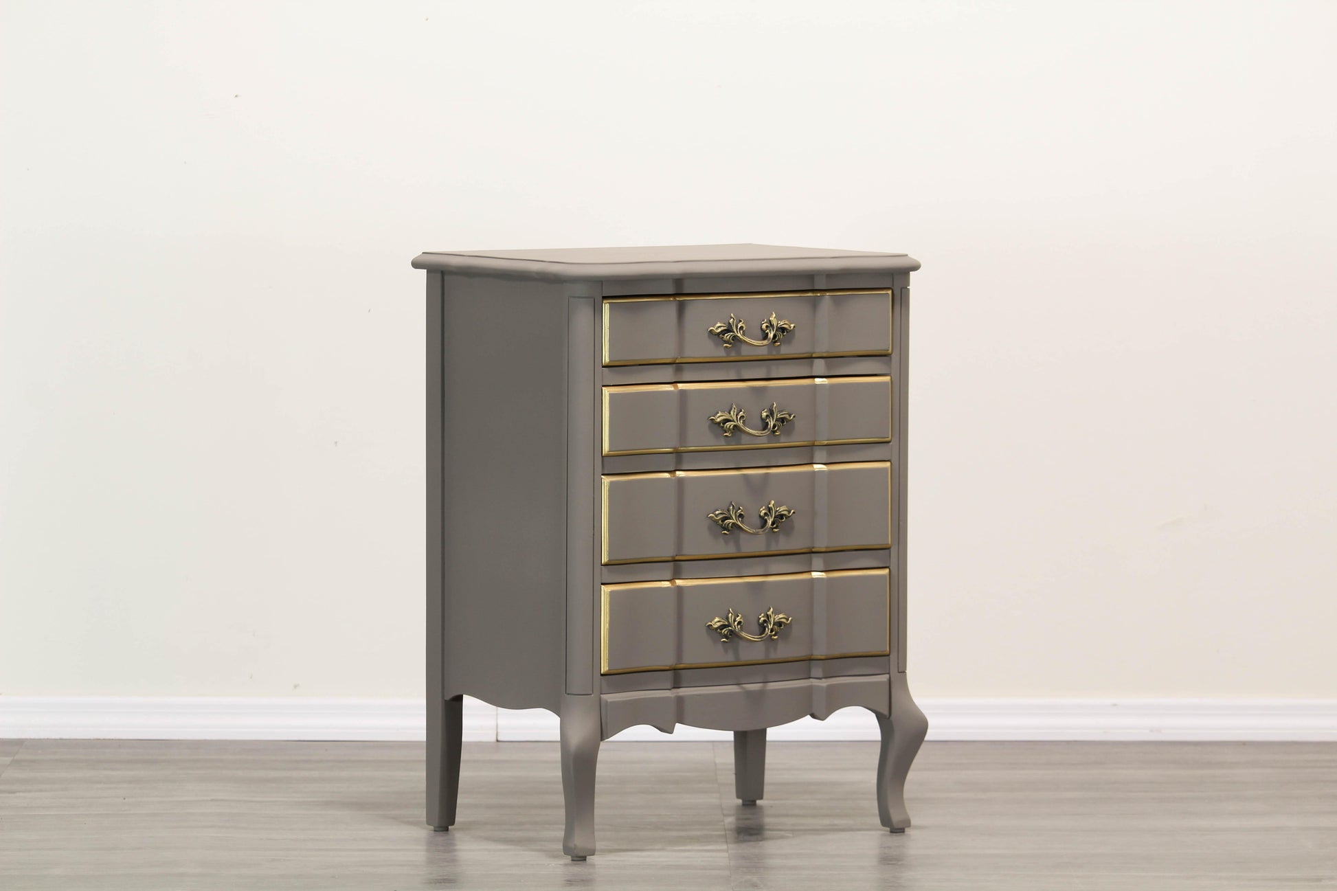 Vintage French style Solid built nightstand. This nightstand is professionally refinished in greige taupe and gold painted accents with a  satin finish.  Dimensions: 20"Width x 15"Depth x 28"Height. 