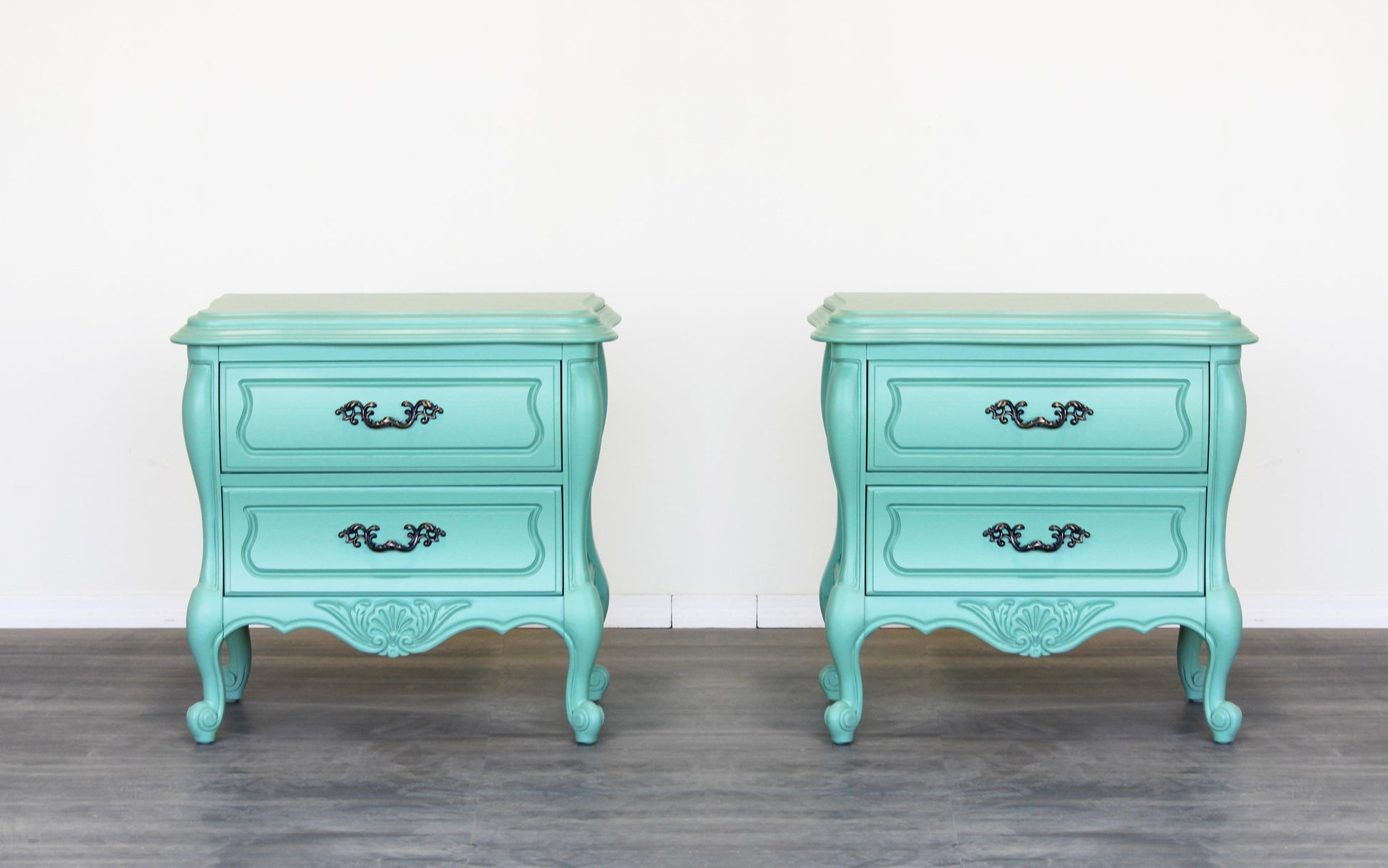 Vintage pair of solid built seafoam green nightstands.  Dimensions; 26" Width x 18" Depth x 25" Height. 