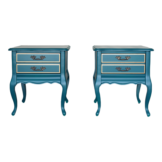 Vintage French style nightstands of single drawers.  The nightstands are professionally refinished in turquoise with gold painted accents in a satin finish.  Dimensions; 20"Width x 26" Depth x 23"Height. 