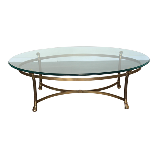 Vintage Solid Brass Italian coffee table with glass top.  Dimensions; 49"Width x 28" Depth x 16" Height. 