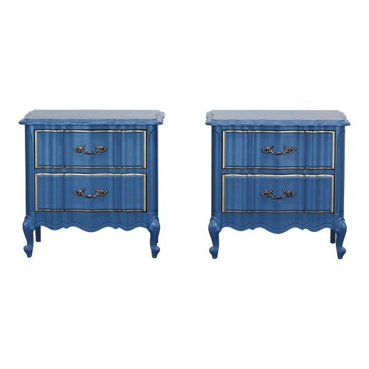 Pair of French provincial blue nightstands of two drawers.  The nightstands are professionally refinished in blue with gold painted accents in a satin finish.  Dimensions; 24" Width x 17"Depth x 24"Height. 