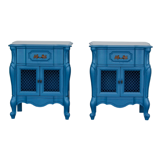 Vintage pair of French style nightstands.  The nightstands are solid built with dovetail joints, and are professionally refinished in blue with a satin finish.  Dimensions; 23" Width x 16"Depth x 28" Height. 