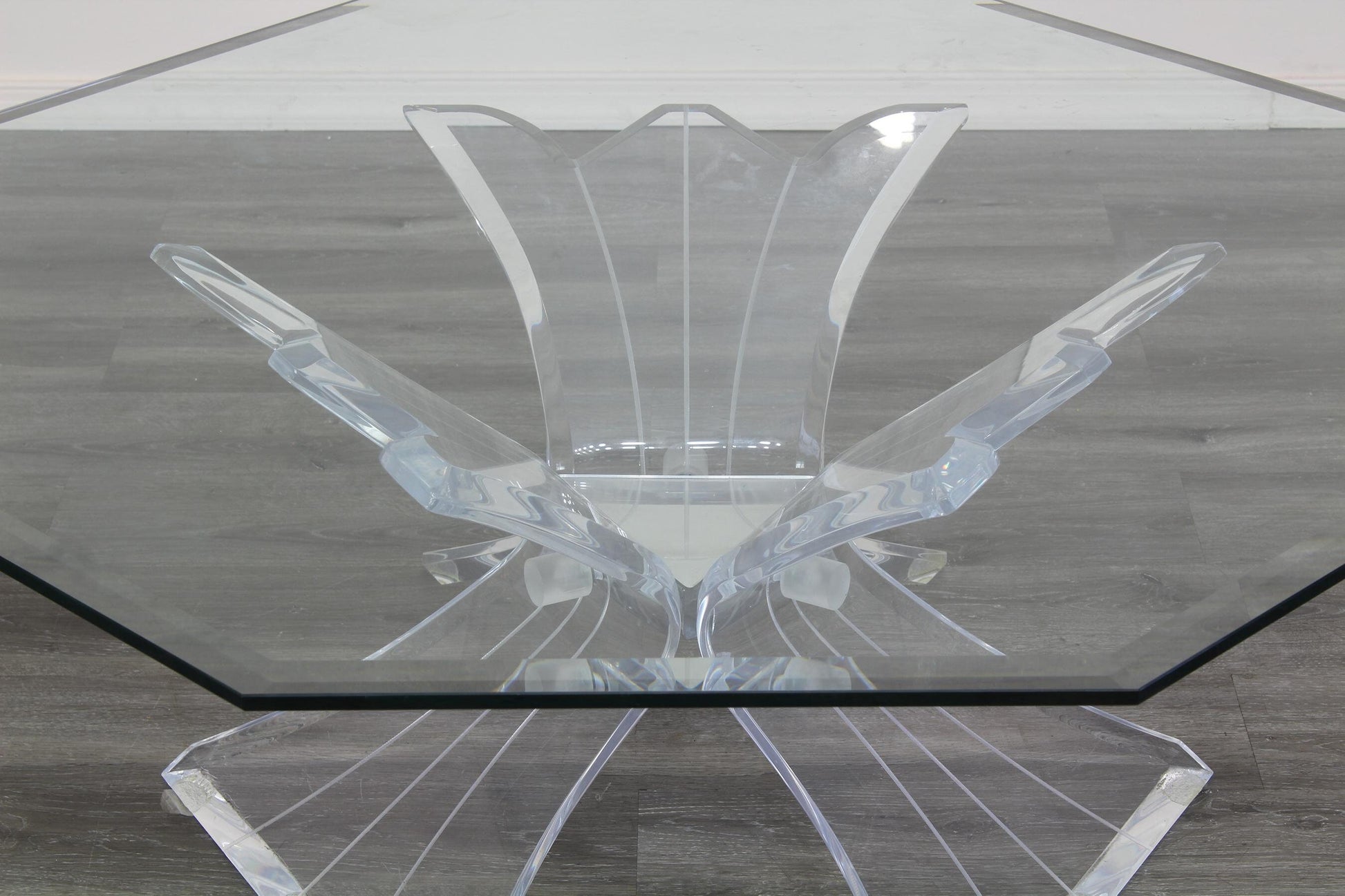 Vintage Lucite butterfly coffee table with Octagonal glass top.  This lovely table is in great vintage condition. Dimension; 42 in. Width x 42 in. Depth x 16 in. Height. 