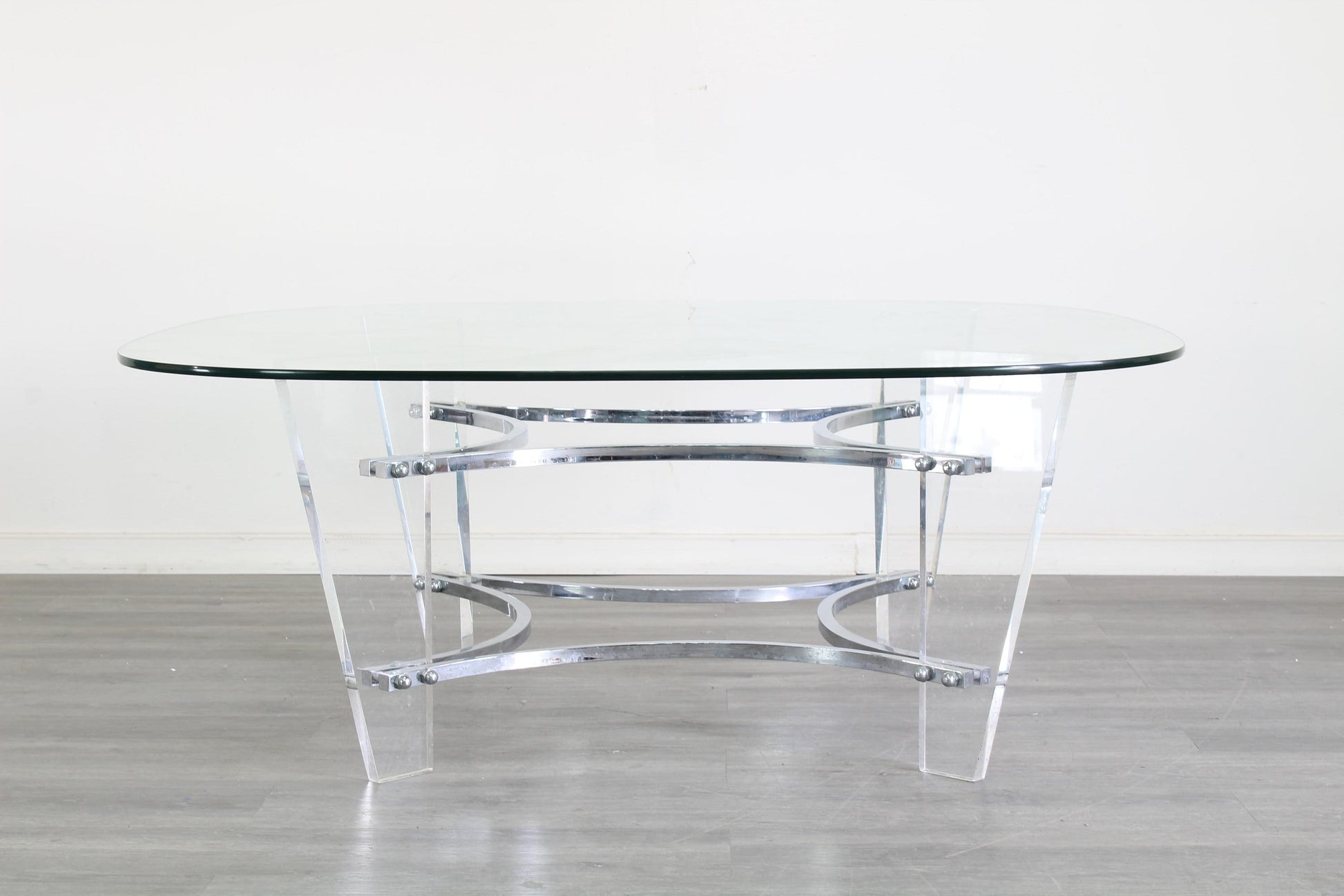 Vintage Lucite and chrome coffee table with glass top.  This table is in great vintage condition.  Dimensions; 42" Width x 42" Height x 17" Height. 