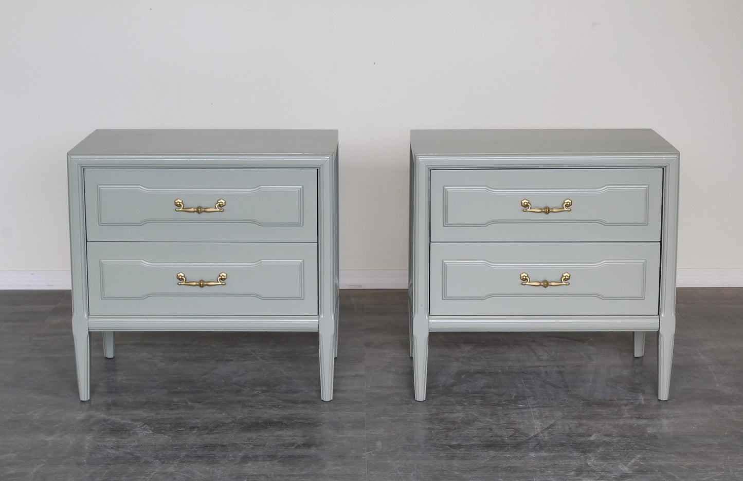 Pair of Mid century caledon green nightstands.  The nightstands are solid built with dovetail joint.  These nightstands are professionally refinished in a caledon green with satin top coat.  Dimensions: 25"With x 16"Depth x 24"Height. 