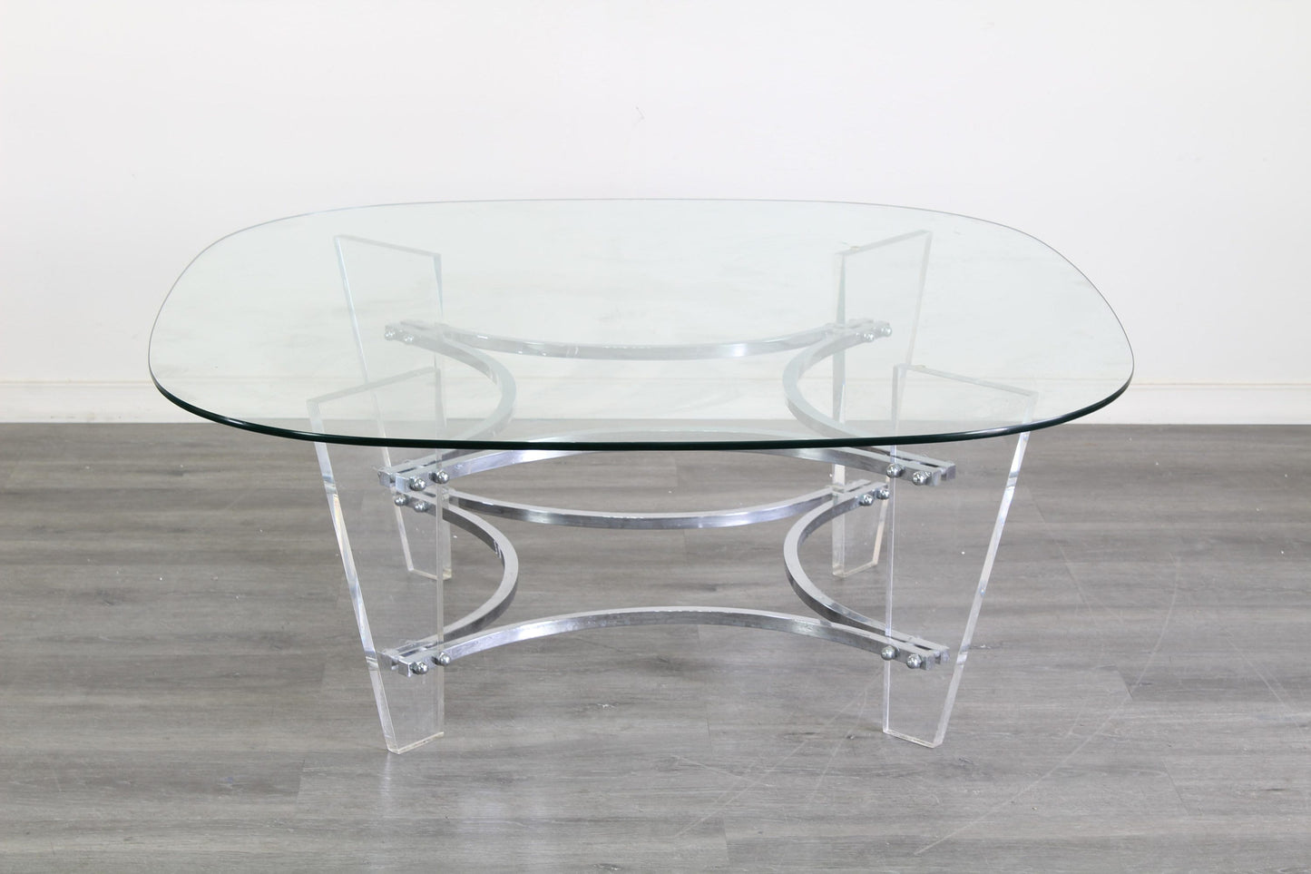 Vintage Lucite and chrome coffee table with glass top.  This table is in great vintage condition.  Dimensions; 42" Width x 42" Height x 17" Height. 